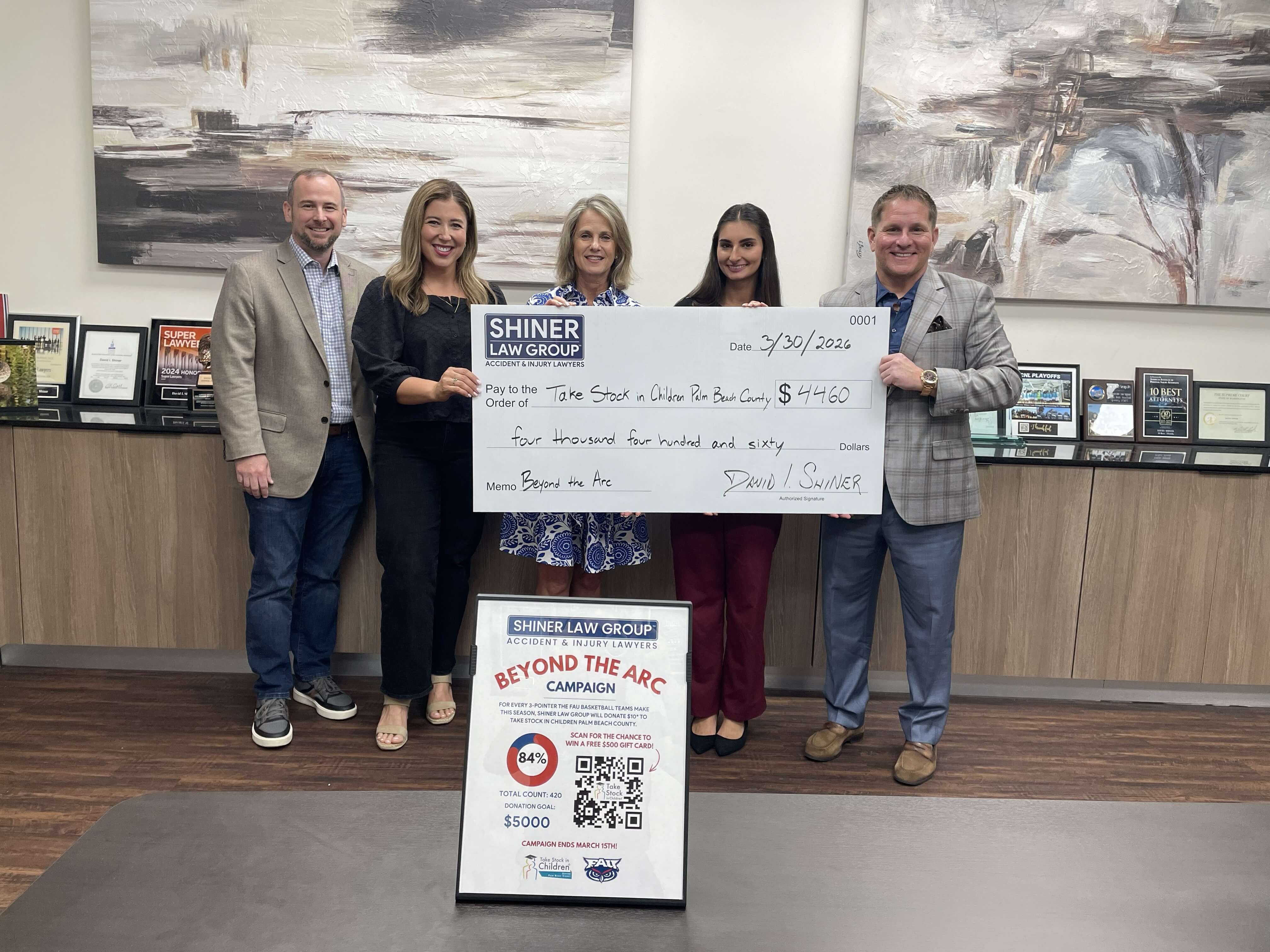 Beyond the Arc Challenge check donation to Take Stock in Children Palm Beach County